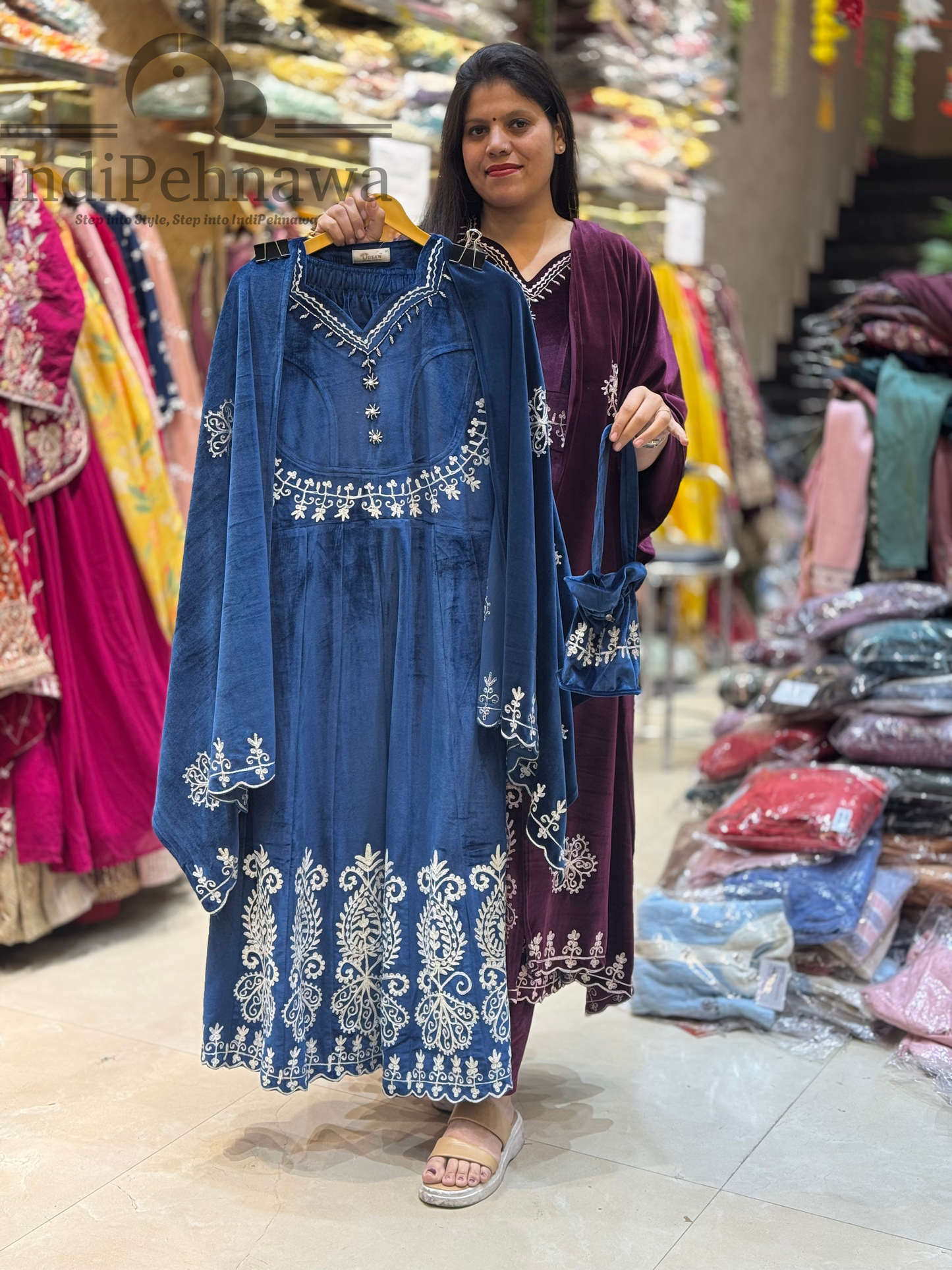 Glamorous Velvet Anarkali Suit with Handcrafted Potli and Stunning Thread Work