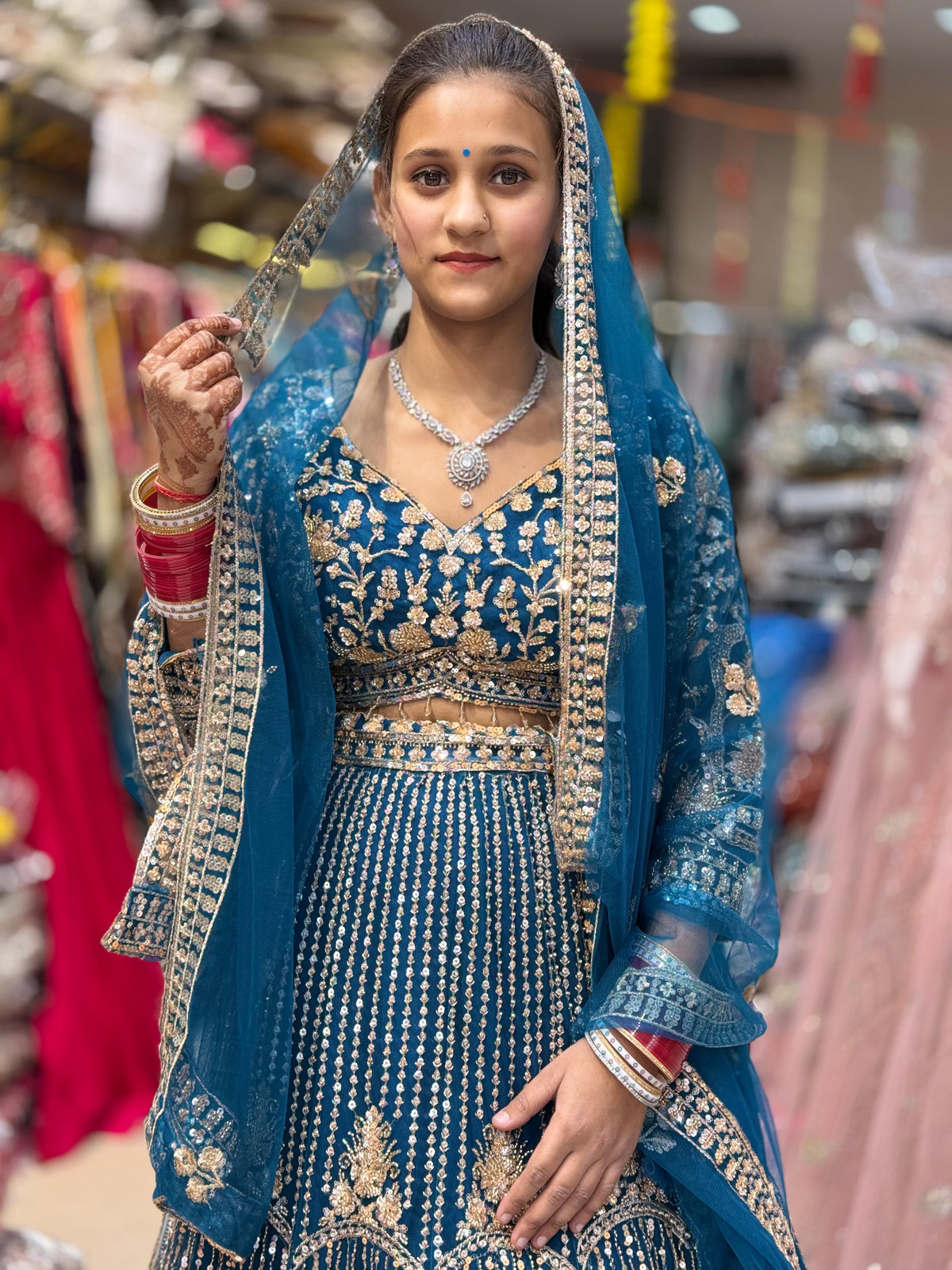SEA GREEN WEDDING WEAR NITED THREAD AND MIRROR WORK HEAVY LEHNGA