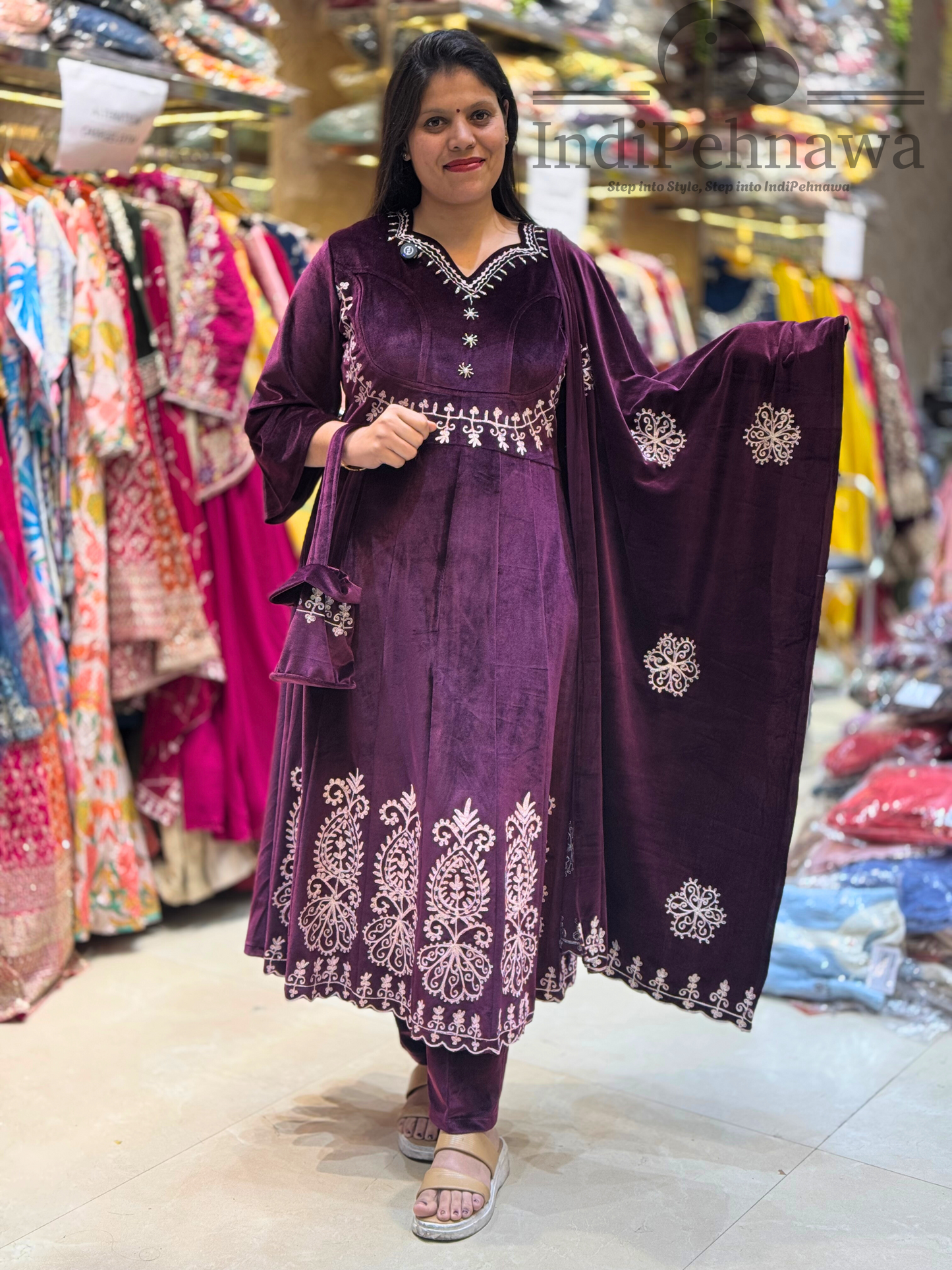 Glamorous Velvet Anarkali Suit with Handcrafted Potli and Stunning Thread Work