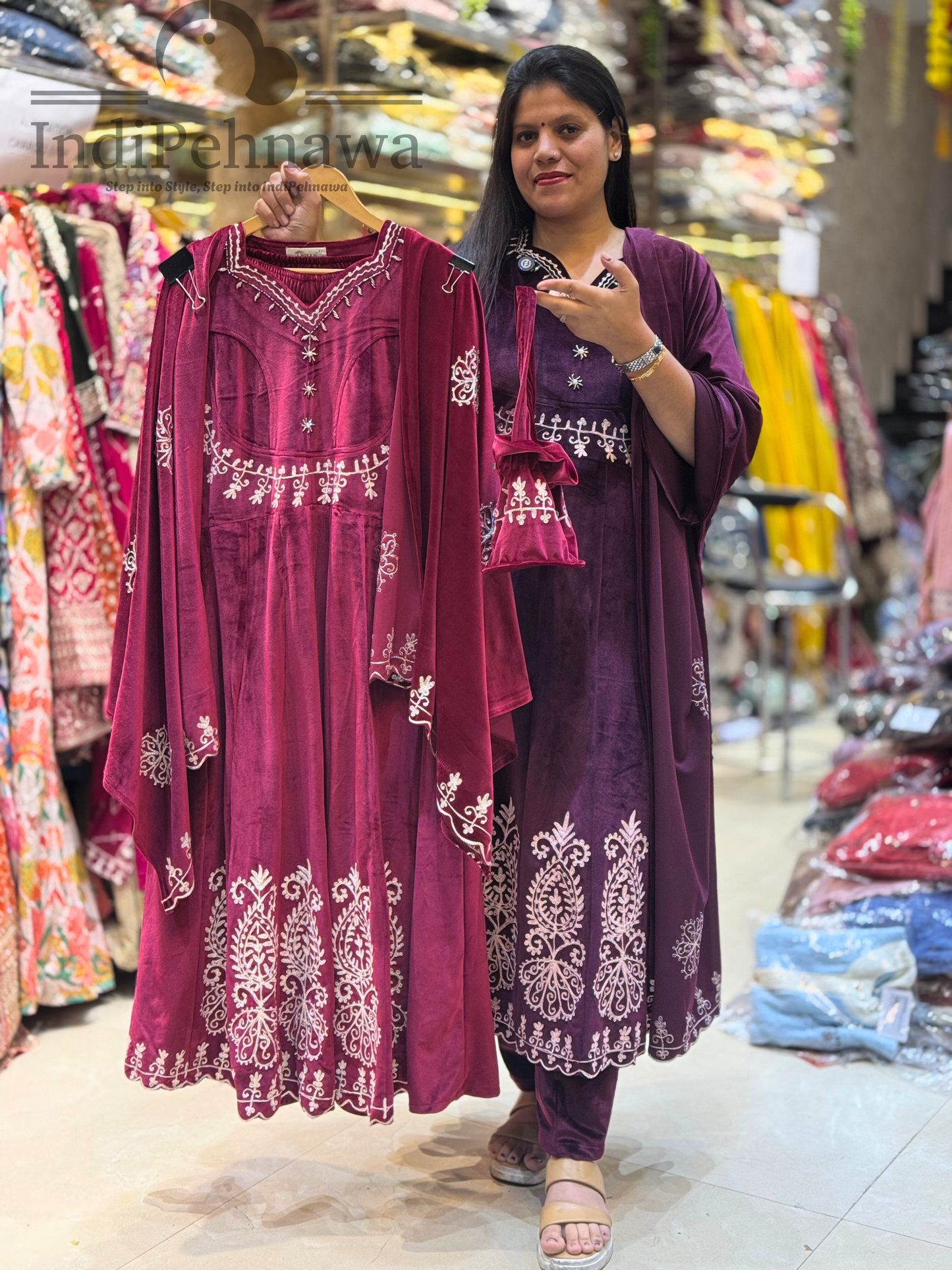 Glamorous Velvet Anarkali Suit with Handcrafted Potli and Stunning Thread Work