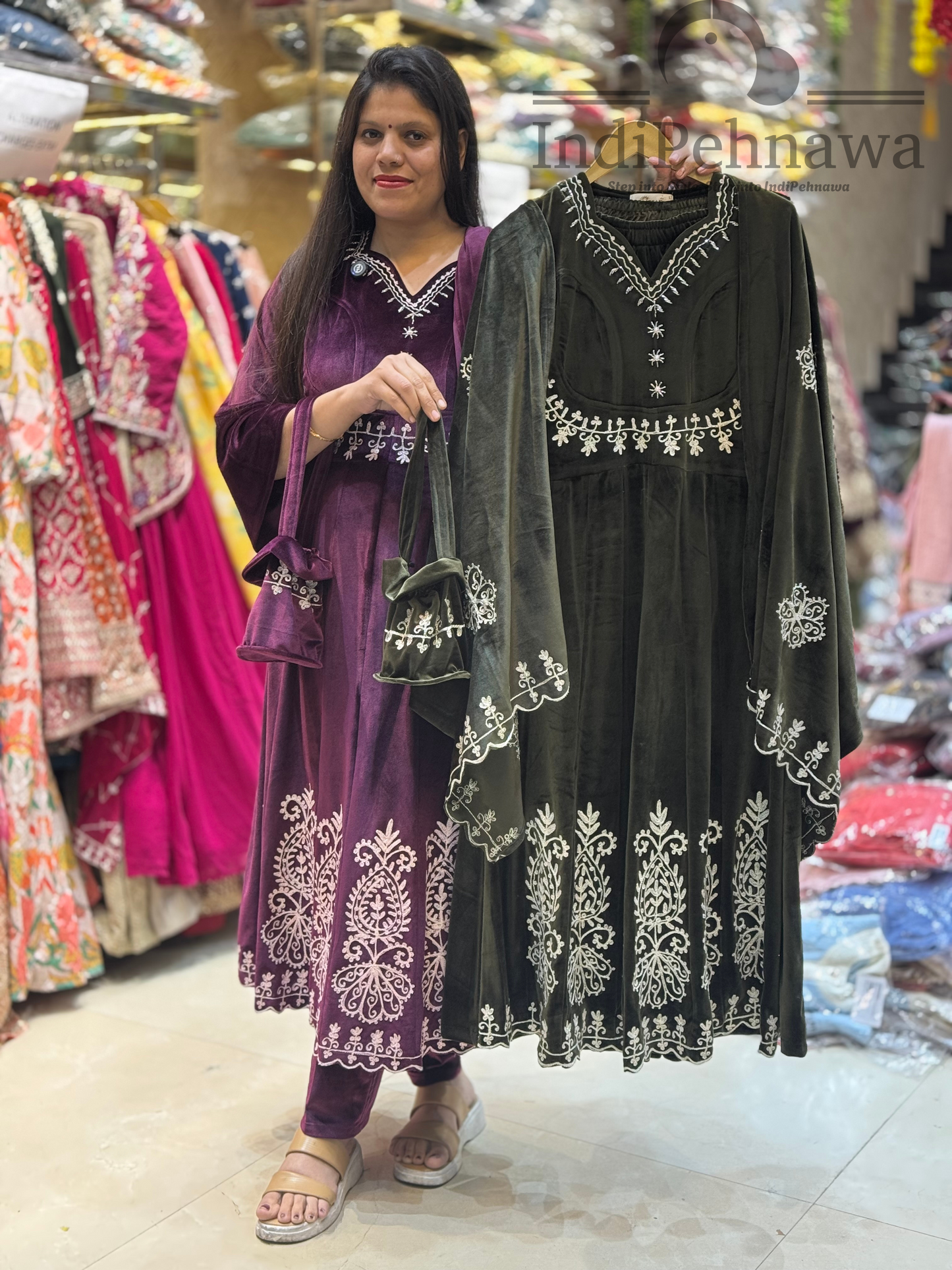 Glamorous Velvet Anarkali Suit with Handcrafted Potli and Stunning Thread Work