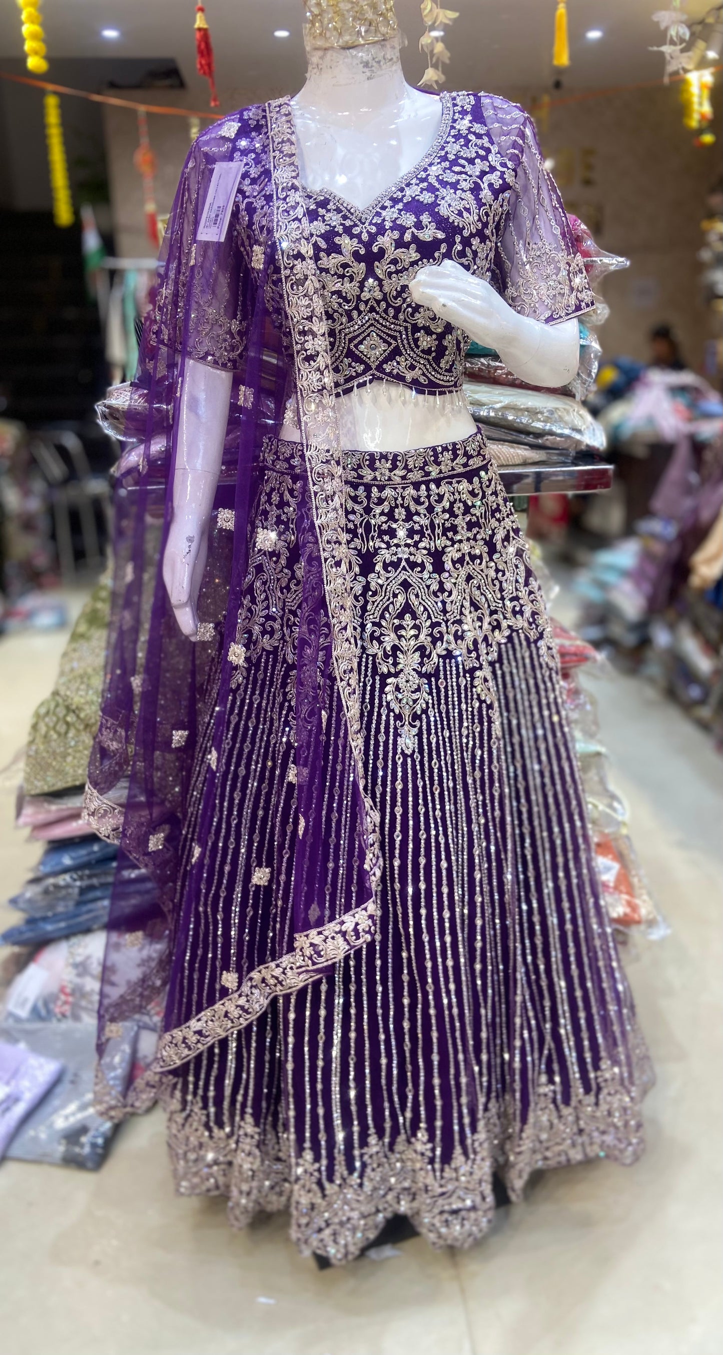 PURPLE WEDDING WEAR FULL TILLA AND MIRROR WORK FULL FLAIR LEHENGA