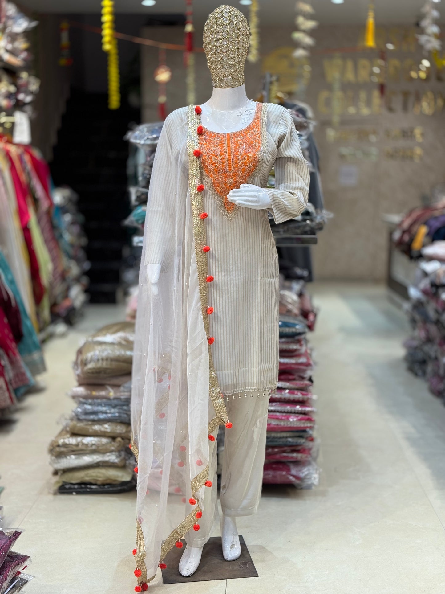 ORANGE DESIGN WITH IVORY ORGENZA SUIT