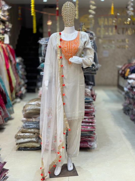 ORANGE DESIGN WITH IVORY ORGENZA SUIT