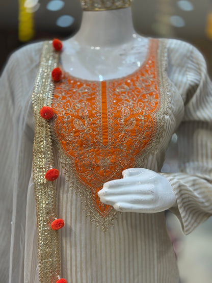 ORANGE DESIGN WITH IVORY ORGENZA SUIT