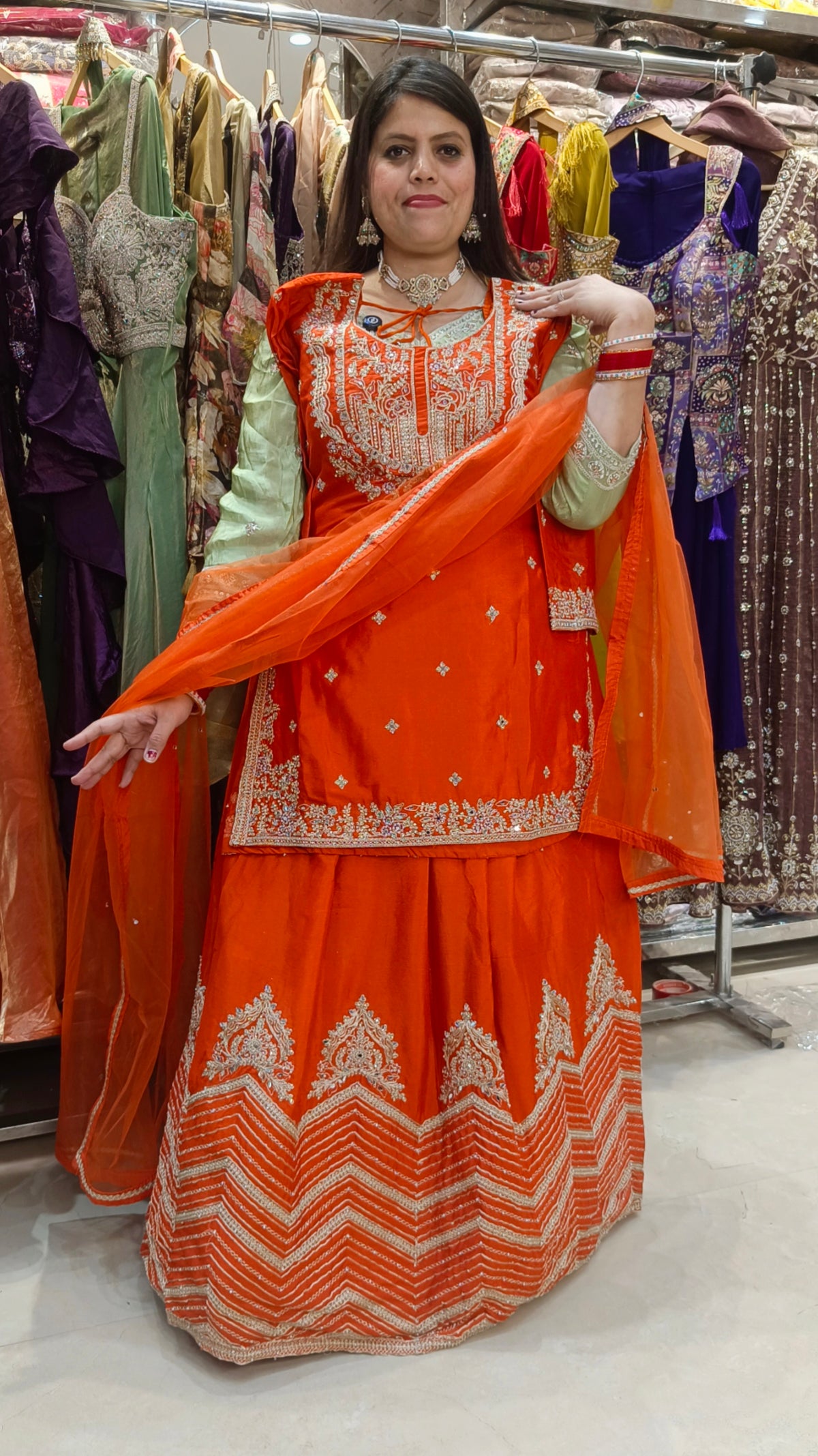 ORANGE SILVER WORK NECK FULL FLAIR LEHENGA
