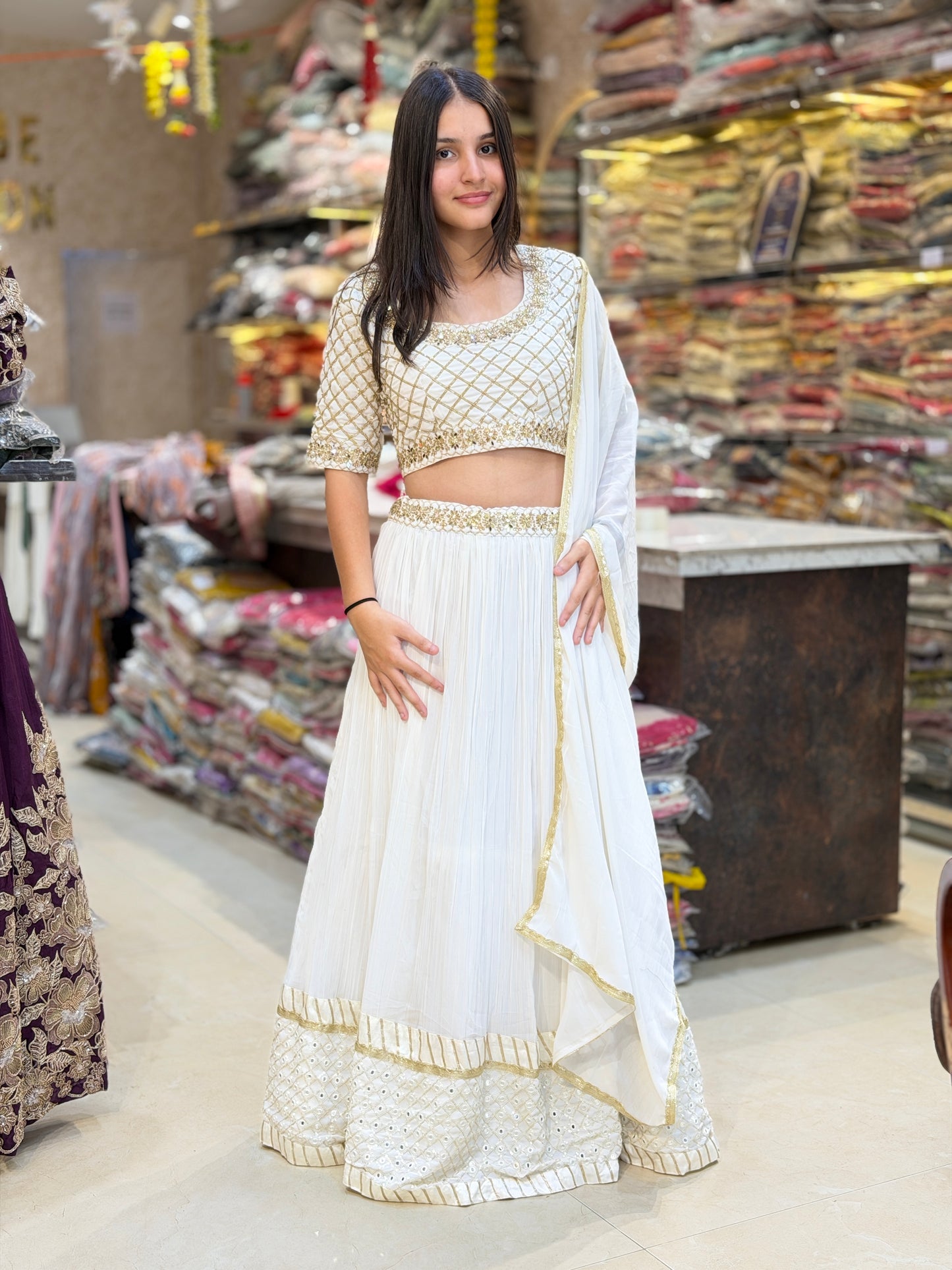 WHITE WITH GOLDEN SIPPI AND TILLA WORK FULL FLAIR LEHENGA