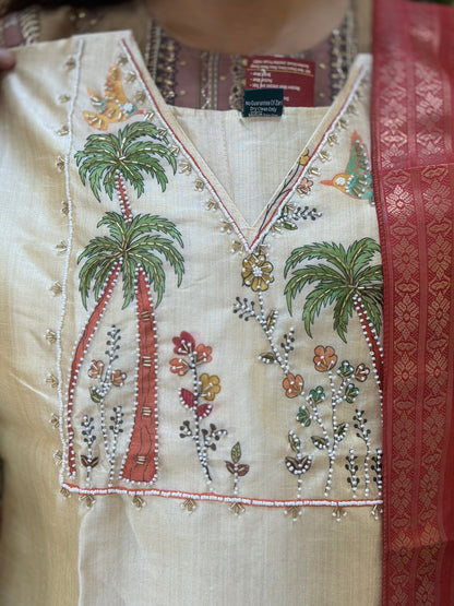 ROYAL AND DESIGNER ANTIQUE IVAORY WITH ORANGE BANARSI SUIT WITH PEARL WORK