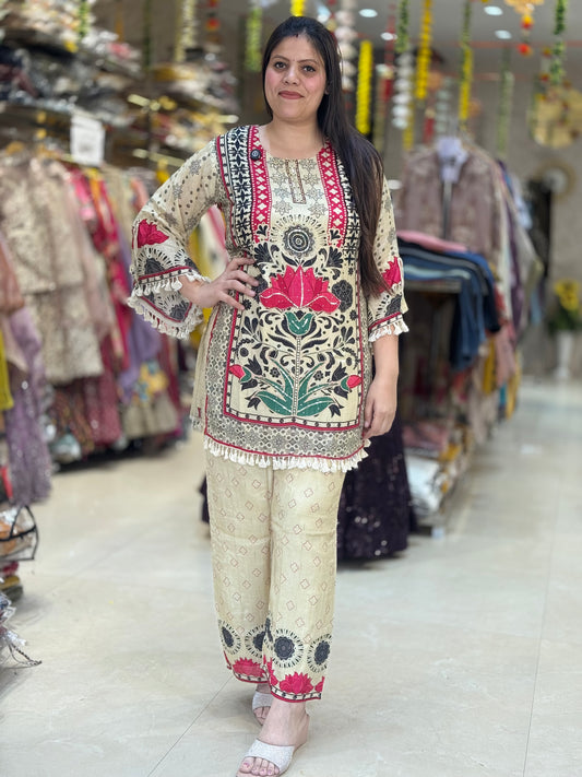 IVORY CORDSET IN CREPE WITH FULL CUTT DANA WORK BY INDIPEHNAWA