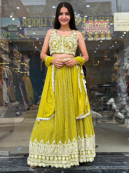 YELLOW BEAUTIFUL TOP WITH FULL FLAIR LEHENGA