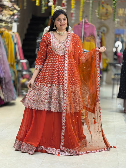 WEDING SPECIAL RUST FULL HEAVY PEPLUM WITH FULL ZARI AND JARKAN WORK WITH FULL HEAVY CAN-CAN LEHNGA