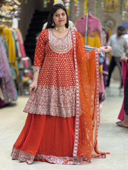 WEDING SPECIAL RUST FULL HEAVY PEPLUM WITH FULL ZARI AND JARKAN WORK WITH FULL HEAVY CAN-CAN LEHNGA