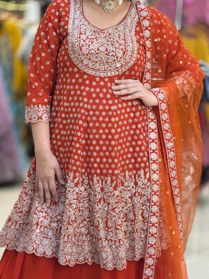 WEDING SPECIAL RUST FULL HEAVY PEPLUM WITH FULL ZARI AND JARKAN WORK WITH FULL HEAVY CAN-CAN LEHNGA