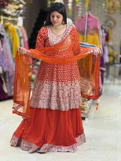 WEDING SPECIAL RUST FULL HEAVY PEPLUM WITH FULL ZARI AND JARKAN WORK WITH FULL HEAVY CAN-CAN LEHNGA