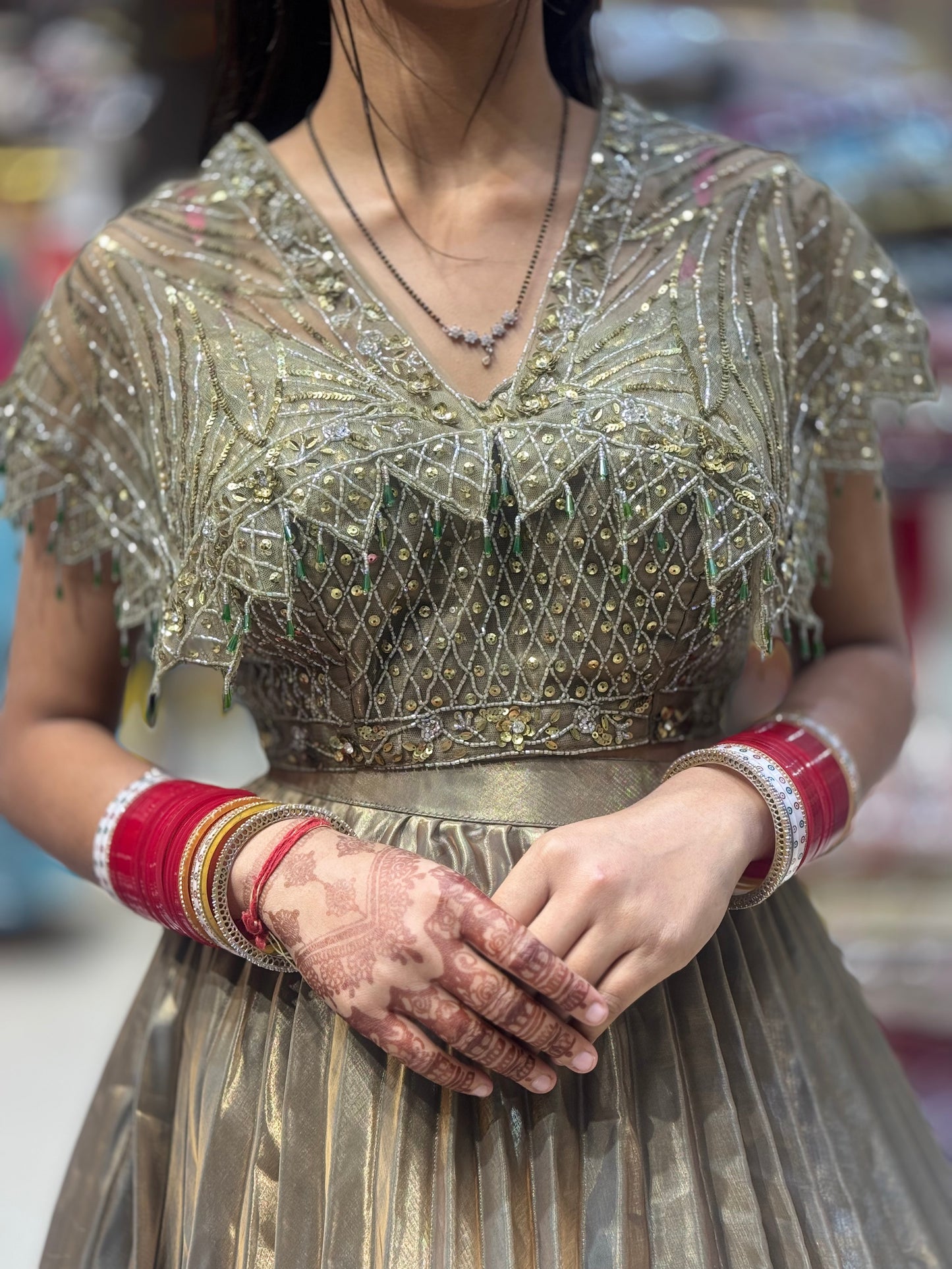 DESINER GOLDEN LEHENGA WITH SIPPY WORK IN CHINON